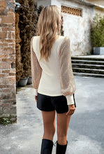 Ribbed mock neck top with sequin sleeves